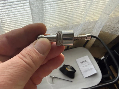 Photo d'un client : pièce de fixation de la remorque de vélo