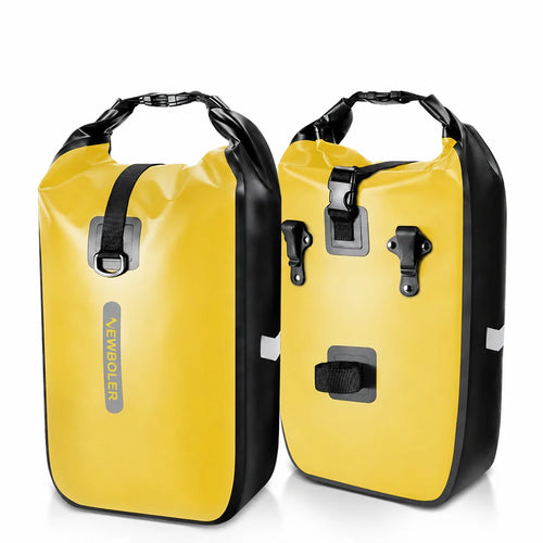 Deux sacoches de porte-bagages vélo cylindriques jaunes côte à côte sur fond blanc