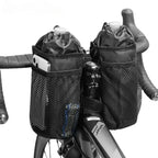 Deux porte-bidons noirs en filet fixes sur le guidon d'un velo, avec un smartphone visible.