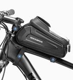 Sacoche de cadre vélo noire fixée sur le tube supérieur d'un vélo en extérieur