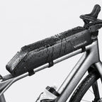 Sacoche de cadre vélo noire imperméable fixée sur le tube supérieur d'un vélo