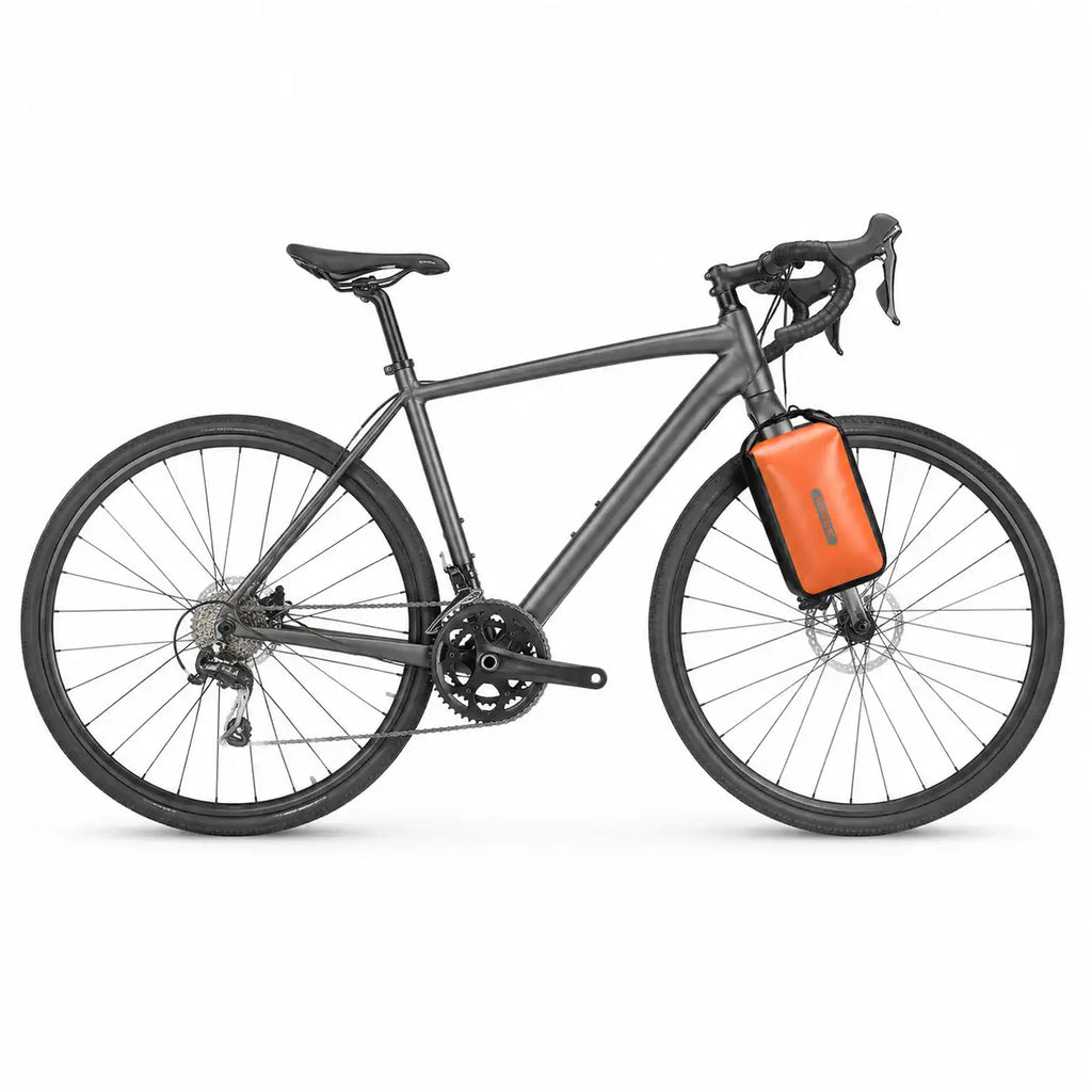 Vélo de route gris avec sacoche de fourche orange vue de côté complète