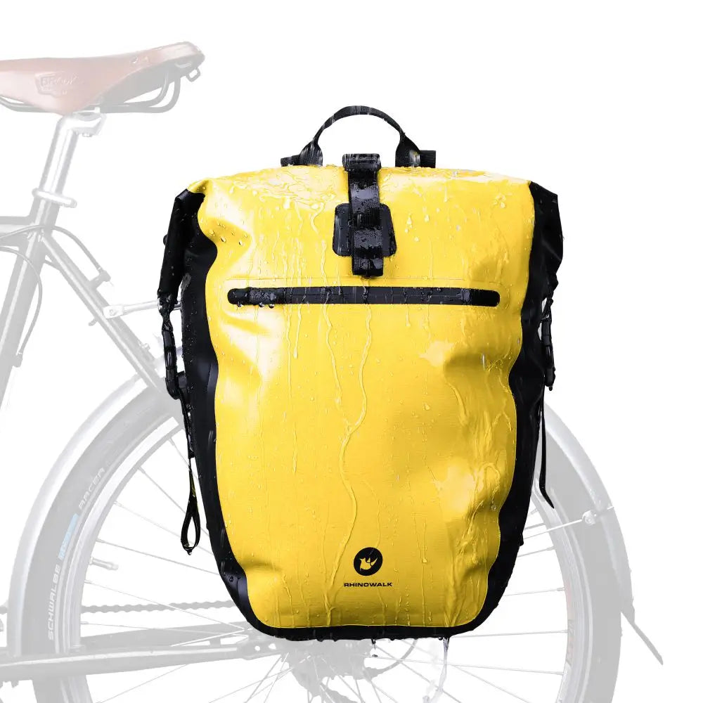 Sacoche jaune étanSacoche étanche gouttes eau impérméable porte-bagages test pluieche gouttes eau test impérméabilité porte-bagages 