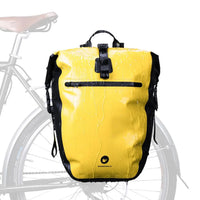 Sacoche jaune étanSacoche étanche gouttes eau impérméable porte-bagages test pluieche gouttes eau test impérméabilité porte-bagages 