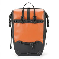 Sacoche de porte-bagage vélo orange et noire vue de dos avec système de fixation