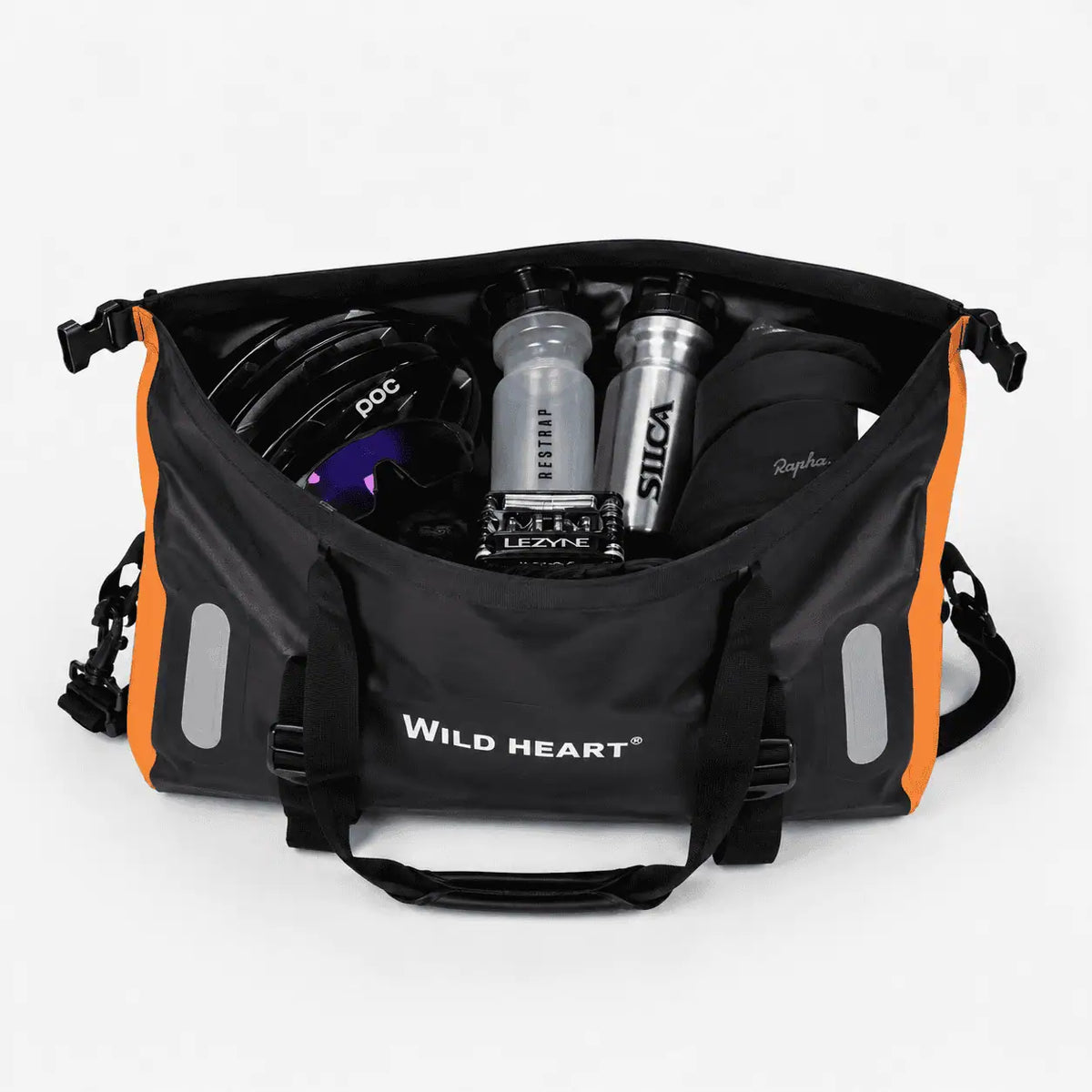 Intérieur ouvert de la sacoche vélo 18L noire et orange contenant deux bidons