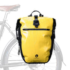 Sacoche vélo 27L jaune installée sur le porte-bagage arrière