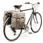 Sacoche vélo porte-bagage triple kaki sur vélo rétro noir selle cuir