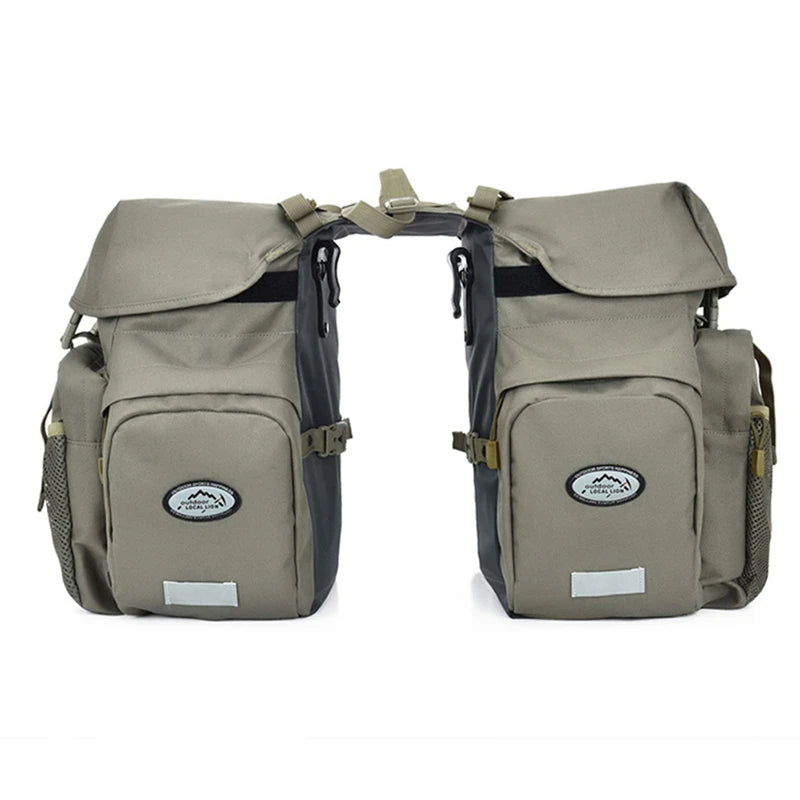 Paire de sacoches de porte-bagages kaki avec multiple poches et rabat, presentees sur fond blanc.
