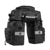 Set de trois sacoches de porte-bagages noires avec bandes reflechissantes, comprenant deux sacoches laterales et une sacoche centrale.